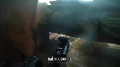 Belarusian volunteers firing small arms fire towards the Russian positions and one of the soldiers fired a grenade launcher. Liptsi village (dachas), Kharkiv region.