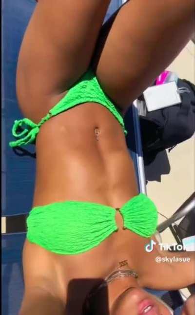 Skyla Schulte by the pool 🔥💚🤍