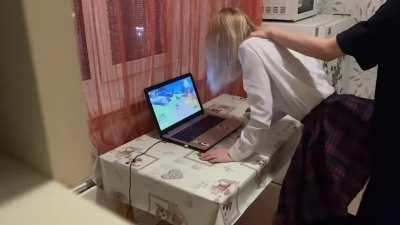 Distracting her from playing Genshin Impact with his cock