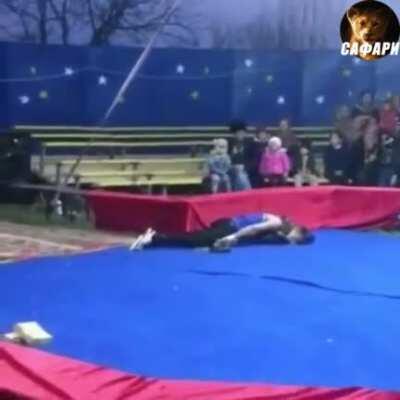 The man is strangled by a snake to death