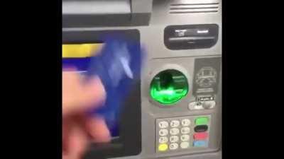 insert card into an atm as shown