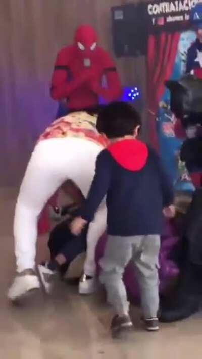 A group of kids attacking Thanos