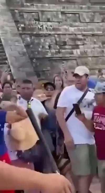In Mexico, a tourist climbed and danced on a sacred Mayan pyramid and then got attacked by a mob of locals.
