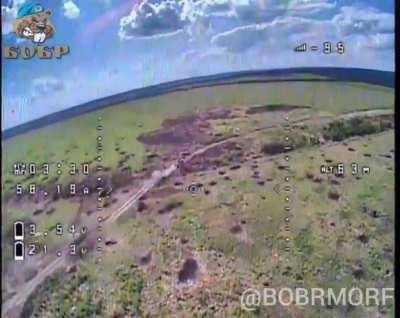 RU pov: A Russian FPV drone hit a Bradley IFV on the move. 