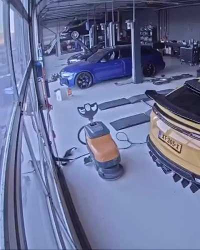 Dutch Businessman defies emergencypub services trying to save luxury cars from burning dealership