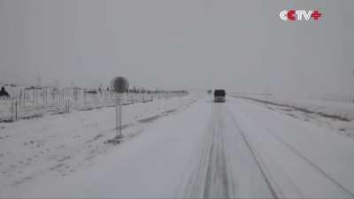 Xinjiang Herdsmen on Horseback Send Off Athletes to Winter Olympics