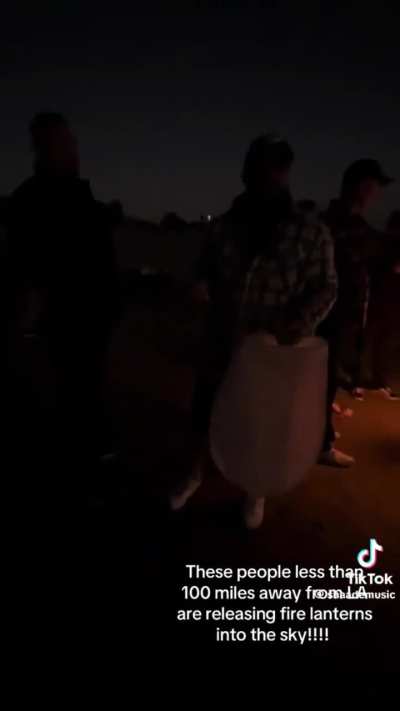 Lady confronts group releasing flame powered lanterns in SOCAL near the wildfires 