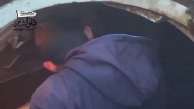 Syrian rebel tank firing at government forces, including view from the tank and showing the shells being loaded. Claimed to be December 2014.