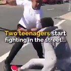 This man brilliantly breaks up a street fight between two teenage boys.