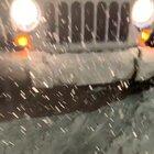 Seattle: Lady tries to run over pedestrians after snowball hits her car!