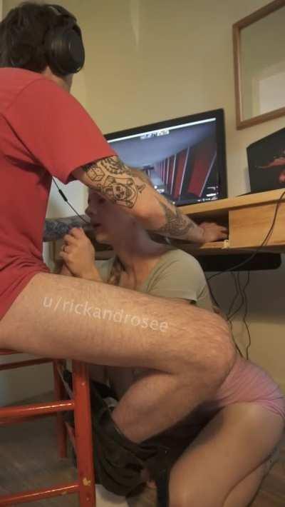 Jacking him off while he games