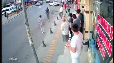 Watching a bit of madness while enjoying an ice cream.