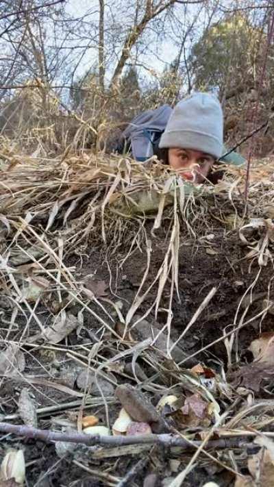 Hiker takes a video selfie with a stoat