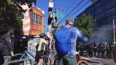 Seattle man throws back flashbang just before it explodes