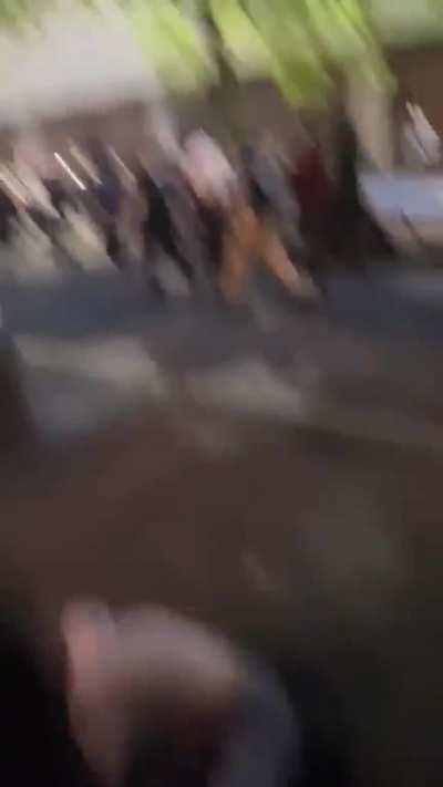 Female protestor knocked to the ground by NYPD officer (now in the ER)