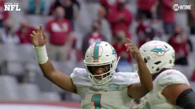 Tua Gives Flores the Game Ball