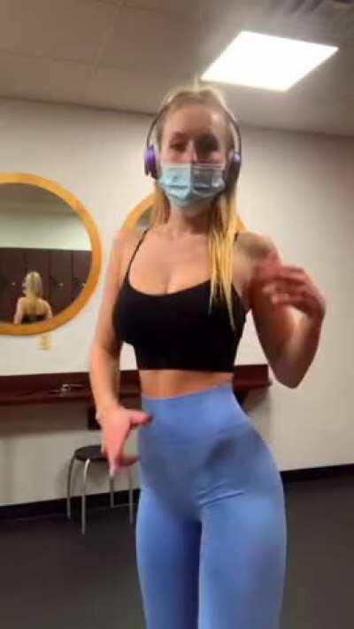 Working on her body with her friend