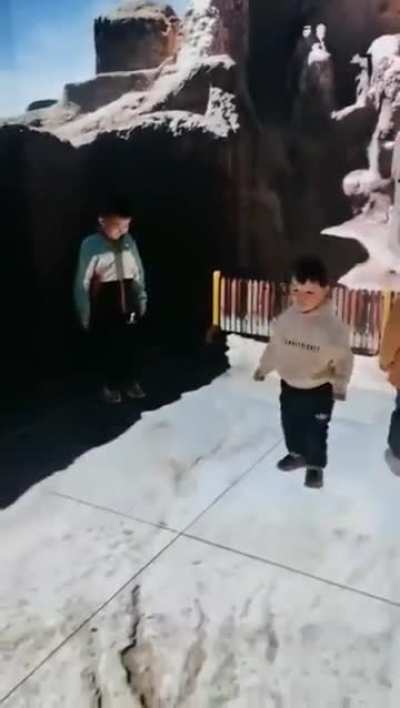 The Vection Illusion at work, fast-moving visuals trick the brain into losing balance—causing these kids to fall instantly.