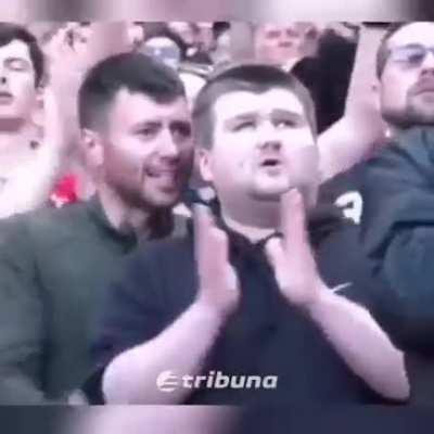 Narrating the entire game to his blind best friend