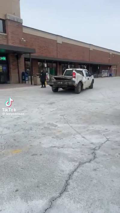 Man laughing at the shape of a truck.