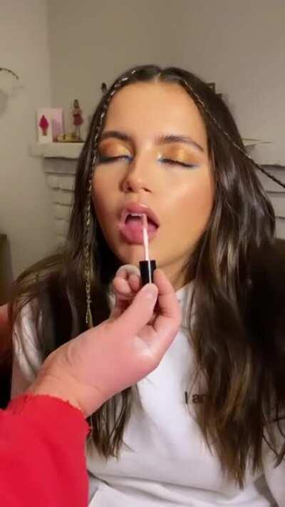 Getting her lipstick done 👄💄