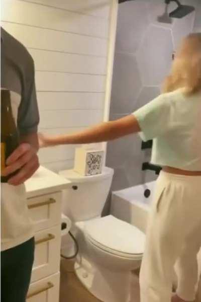 The best friend thought she was filming a reaction video to the new bathroom until she found the pregnancy test .