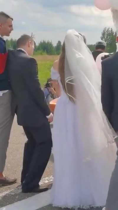 When you’ve drunk far too much vodka before your wedding but your pal has your back!