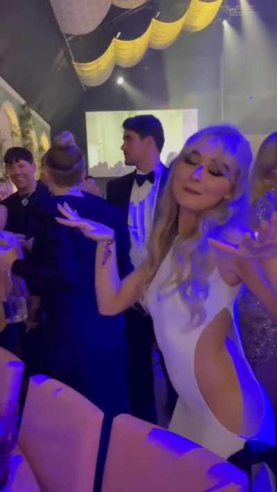 Enjoying herself at amfAR after party