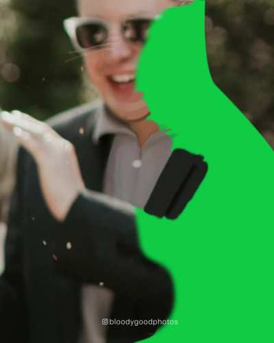 I was asked to remove the wedding guest in the black dress