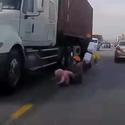 Driver bumps into family riding a scooter.