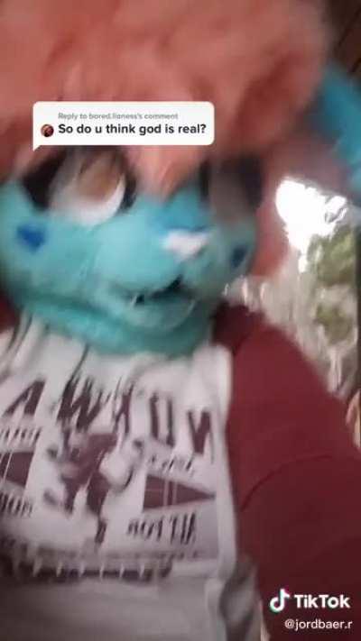 Sorry if you’re indoctrinated said the woman in the furry mask