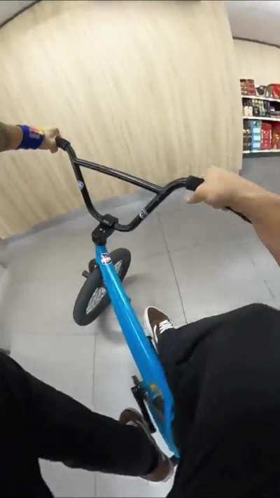 Riding Bmx inside the market