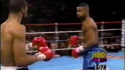 Roy Jones Jr. kissing his right hand before planting it on his opponents domes