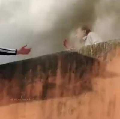 Old man saved from his burning house