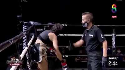 Muay Thai fighter uses 8 count to pop her arm back into the socket.