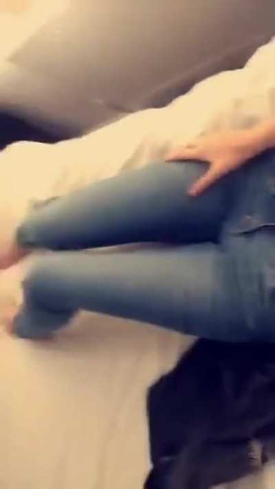 No top, just blue jeans
