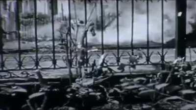 A U.S. Army soldier uses a flamethrower to burn out a Japanese pillbox during fierce fighting in the city of Manila, Philippines (February 1945)