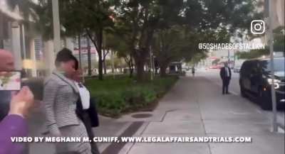 Megan leaving court earlier today