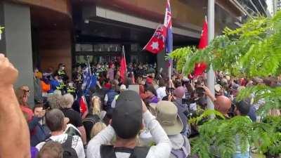 Anti-vaccine protestors attempt to storm the ABC headquarters in Melbourne
