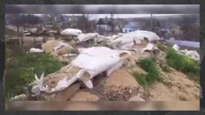 Russians made their breastwork fortification defenses from Ukrainian wheat grain, they had stolen.