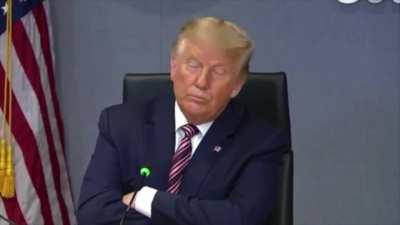 Trump can barely bring himself to pretend to listen to FEMA officials