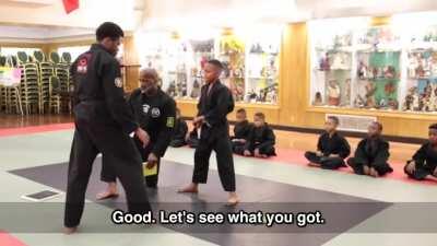 Mentor teaching a child that it is okay to cry