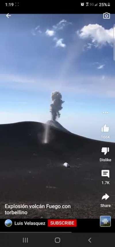 Man captures tornado and volcano explosion at the same time.