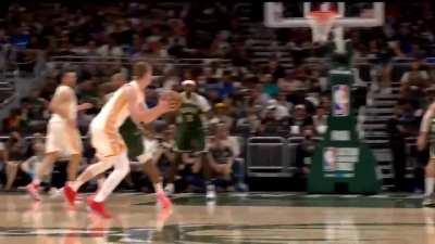 [Highlight] Trae Young behind the back pass to Kevin as he hits the three to beat the shot clock