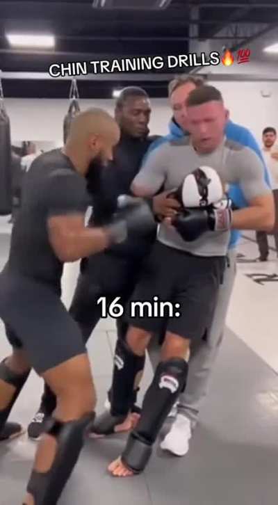 UFC Goat Demetrious Johnson helps novice improve his punch resistance with chin training drills