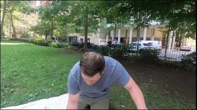 Manchild shoves a camera in the faces of normal people trying to enjoy their picnic