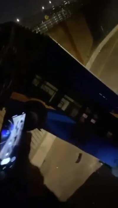 In the Bronx, NY, a bus is hanging off a bridge after an accident