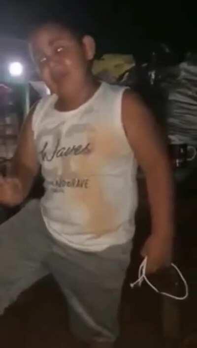 Kid ciclying in brazilian roads