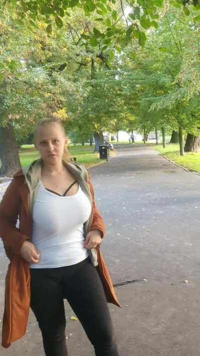 Simply put, a humble student walking in a city park after lectures. Heh