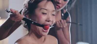Asian girl getting gagged